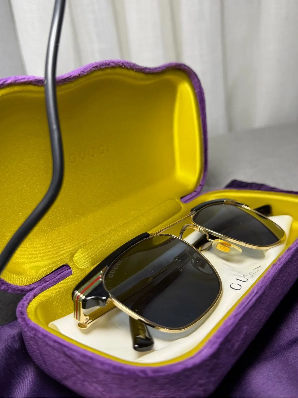 Gucci Black Lensed Sunglasses with Gold-Tone Frame